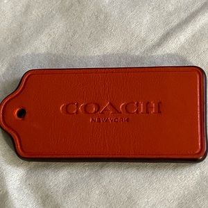 Coach New York bag tag
